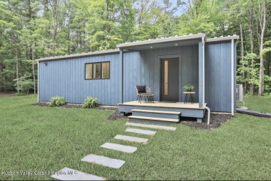 Experience modern simplicity in this newly built, thoughtfully on Rip Van Winkle Country Club in New York - for sale on GolfHomes.com, golf home, golf lot