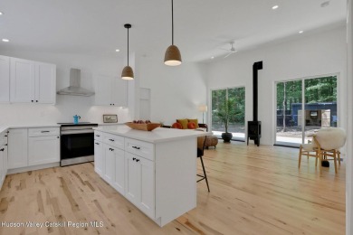 Experience modern simplicity in this newly built, thoughtfully on Rip Van Winkle Country Club in New York - for sale on GolfHomes.com, golf home, golf lot