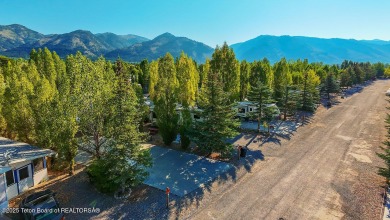 Nestled within the scenic Star Valley Ranch RV Park, this on Star Valley RV Golf Course in Wyoming - for sale on GolfHomes.com, golf home, golf lot