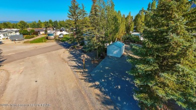 Nestled within the scenic Star Valley Ranch RV Park, this on Star Valley RV Golf Course in Wyoming - for sale on GolfHomes.com, golf home, golf lot