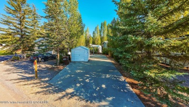 Nestled within the scenic Star Valley Ranch RV Park, this on Star Valley RV Golf Course in Wyoming - for sale on GolfHomes.com, golf home, golf lot