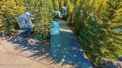 Nestled within the scenic Star Valley Ranch RV Park, this on Star Valley RV Golf Course in Wyoming - for sale on GolfHomes.com, golf home, golf lot