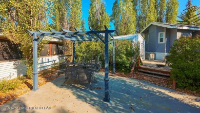 Nestled within the scenic Star Valley Ranch RV Park, this on Star Valley RV Golf Course in Wyoming - for sale on GolfHomes.com, golf home, golf lot