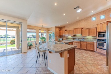 STUNNING VIEWS! Enjoy golf, lake, & mountain views from the on Tuscany Falls At Pebble Creek in Arizona - for sale on GolfHomes.com, golf home, golf lot