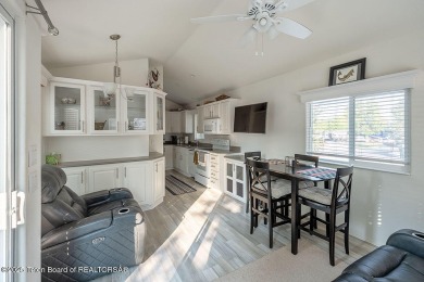 Discover a charming park model in the heart of Star Valley Ranch on Star Valley RV Golf Course in Wyoming - for sale on GolfHomes.com, golf home, golf lot
