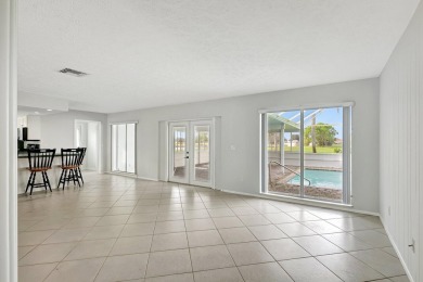 Panoramic golf and lake views abound at this Sandpiper Bay gem! on The Saints At Port St Lucie Golf Course in Florida - for sale on GolfHomes.com, golf home, golf lot