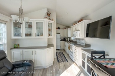Discover a charming park model in the heart of Star Valley Ranch on Star Valley RV Golf Course in Wyoming - for sale on GolfHomes.com, golf home, golf lot