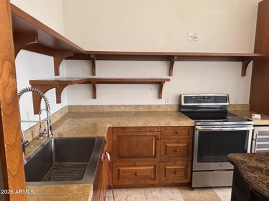 Are you tired of carrying your golf clubs back and forth and on Troon Country Club in Arizona - for sale on GolfHomes.com, golf home, golf lot