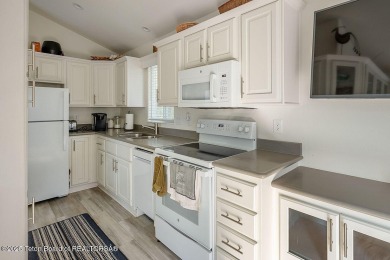 Discover a charming park model in the heart of Star Valley Ranch on Star Valley RV Golf Course in Wyoming - for sale on GolfHomes.com, golf home, golf lot