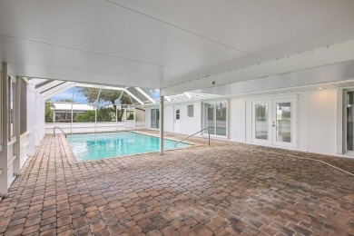 Panoramic golf and lake views abound at this Sandpiper Bay gem! on The Saints At Port St Lucie Golf Course in Florida - for sale on GolfHomes.com, golf home, golf lot