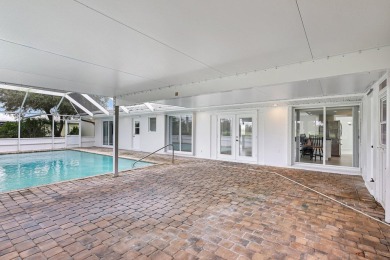 Panoramic golf and lake views abound at this Sandpiper Bay gem! on The Saints At Port St Lucie Golf Course in Florida - for sale on GolfHomes.com, golf home, golf lot