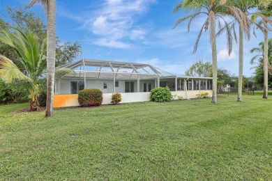 Panoramic golf and lake views abound at this Sandpiper Bay gem! on The Saints At Port St Lucie Golf Course in Florida - for sale on GolfHomes.com, golf home, golf lot