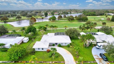 Panoramic golf and lake views abound at this Sandpiper Bay gem! on The Saints At Port St Lucie Golf Course in Florida - for sale on GolfHomes.com, golf home, golf lot