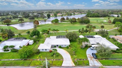 Panoramic golf and lake views abound at this Sandpiper Bay gem! on The Saints At Port St Lucie Golf Course in Florida - for sale on GolfHomes.com, golf home, golf lot