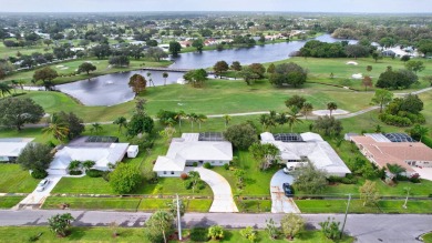 Panoramic golf and lake views abound at this Sandpiper Bay gem! on The Saints At Port St Lucie Golf Course in Florida - for sale on GolfHomes.com, golf home, golf lot