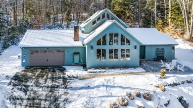 Contemporary 3-bedroom, 2.5-bath home situated on 1+ acres in on Eastman Golf Links in New Hampshire - for sale on GolfHomes.com, golf home, golf lot