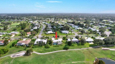 Panoramic golf and lake views abound at this Sandpiper Bay gem! on The Saints At Port St Lucie Golf Course in Florida - for sale on GolfHomes.com, golf home, golf lot