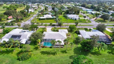 Panoramic golf and lake views abound at this Sandpiper Bay gem! on The Saints At Port St Lucie Golf Course in Florida - for sale on GolfHomes.com, golf home, golf lot