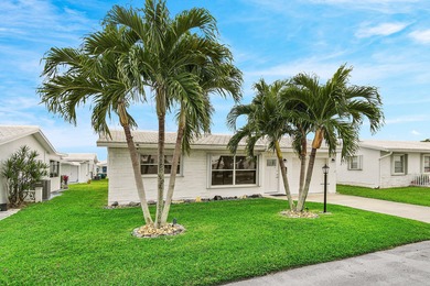 Welcome to this charming and worry-free 2-bedroom, 1-bath on Leisureville Community Golf Course in Florida - for sale on GolfHomes.com, golf home, golf lot