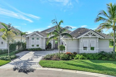 This stunning single-story residence, built in 2023, showcases on The Golf Club At Fiddlers Creek in Florida - for sale on GolfHomes.com, golf home, golf lot