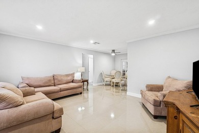 Welcome to this charming and worry-free 2-bedroom, 1-bath on Leisureville Community Golf Course in Florida - for sale on GolfHomes.com, golf home, golf lot