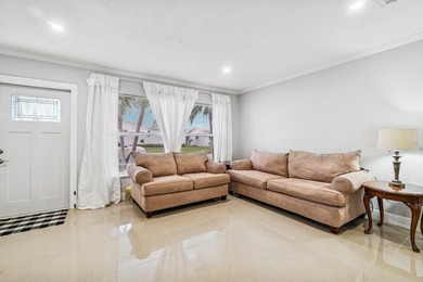 Welcome to this charming and worry-free 2-bedroom, 1-bath on Leisureville Community Golf Course in Florida - for sale on GolfHomes.com, golf home, golf lot