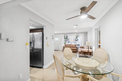 Welcome to this charming and worry-free 2-bedroom, 1-bath on Leisureville Community Golf Course in Florida - for sale on GolfHomes.com, golf home, golf lot