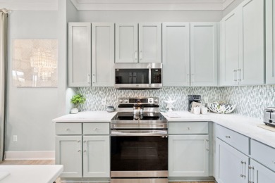 This beautifully renovated end-unit townhome, complete with a on Sandestin Golf and Beach Resort - Raven in Florida - for sale on GolfHomes.com, golf home, golf lot
