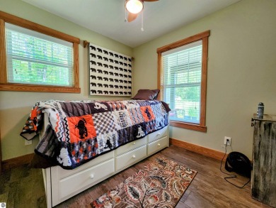Built in 2018, this charming 3 bedroom, 2 bath ranch-style home on Lakes of the North Deer Run Golf Course in Michigan - for sale on GolfHomes.com, golf home, golf lot
