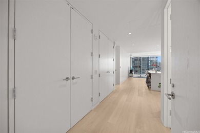 Now available - a rare high-floor, pristine one-bedroom on Ala Wai Golf Course in Hawaii - for sale on GolfHomes.com, golf home, golf lot