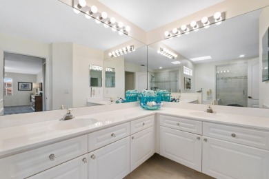 Step into luxury at 81 Monterey Pointe Dr--where modern elegance on PGA National Golf Club in Florida - for sale on GolfHomes.com, golf home, golf lot