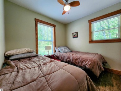 Built in 2018, this charming 3 bedroom, 2 bath ranch-style home on Lakes of the North Deer Run Golf Course in Michigan - for sale on GolfHomes.com, golf home, golf lot