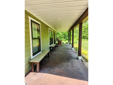Built in 2018, this charming 3 bedroom, 2 bath ranch-style home on Lakes of the North Deer Run Golf Course in Michigan - for sale on GolfHomes.com, golf home, golf lot