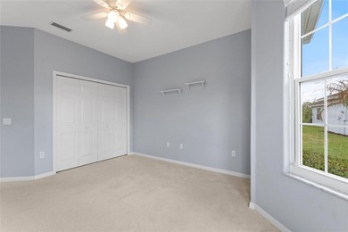 One or more photo(s) has been virtually staged. RidgeDale on Ridgewood Lakes Golf and Country Club in Florida - for sale on GolfHomes.com, golf home, golf lot