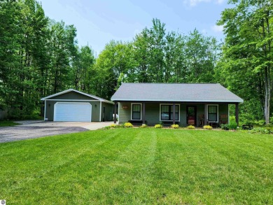 Built in 2018, this charming 3 bedroom, 2 bath ranch-style home on Lakes of the North Deer Run Golf Course in Michigan - for sale on GolfHomes.com, golf home, golf lot