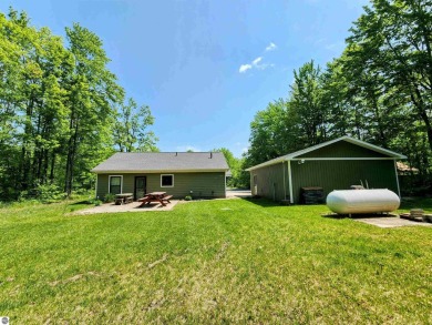Built in 2018, this charming 3 bedroom, 2 bath ranch-style home on Lakes of the North Deer Run Golf Course in Michigan - for sale on GolfHomes.com, golf home, golf lot