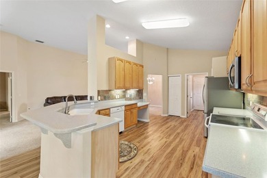 One or more photo(s) has been virtually staged. RidgeDale on Ridgewood Lakes Golf and Country Club in Florida - for sale on GolfHomes.com, golf home, golf lot