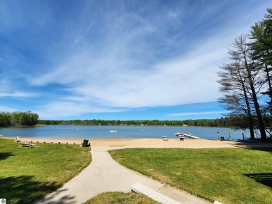 Built in 2018, this charming 3 bedroom, 2 bath ranch-style home on Lakes of the North Deer Run Golf Course in Michigan - for sale on GolfHomes.com, golf home, golf lot