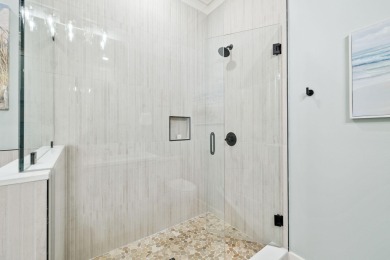 This beautifully renovated end-unit townhome, complete with a on Sandestin Golf and Beach Resort - Raven in Florida - for sale on GolfHomes.com, golf home, golf lot