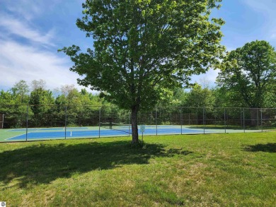 Built in 2018, this charming 3 bedroom, 2 bath ranch-style home on Lakes of the North Deer Run Golf Course in Michigan - for sale on GolfHomes.com, golf home, golf lot