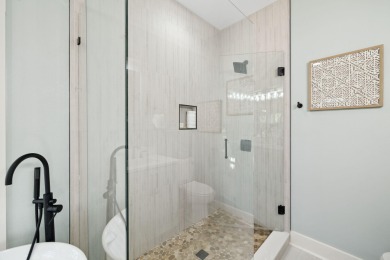 This beautifully renovated end-unit townhome, complete with a on Sandestin Golf and Beach Resort - Raven in Florida - for sale on GolfHomes.com, golf home, golf lot
