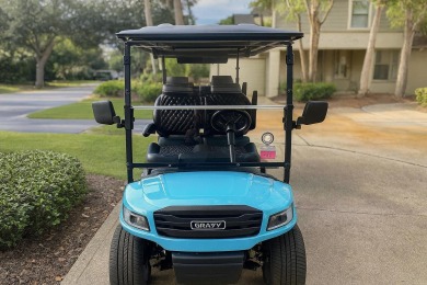 This beautifully renovated end-unit townhome, complete with a on Sandestin Golf and Beach Resort - Raven in Florida - for sale on GolfHomes.com, golf home, golf lot