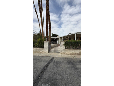 Located in the highly desirable Date Palm Country Club, this on Date Palm Country Club in California - for sale on GolfHomes.com, golf home, golf lot