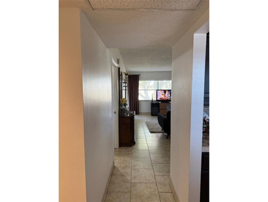 Cozy condo that is well priced in the heart of Lauderhill, FL on Lauderhill Golf Course in Florida - for sale on GolfHomes.com, golf home, golf lot