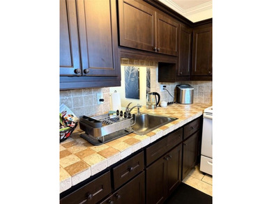 Cozy condo that is well priced in the heart of Lauderhill, FL on Lauderhill Golf Course in Florida - for sale on GolfHomes.com, golf home, golf lot