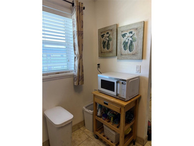 Cozy condo that is well priced in the heart of Lauderhill, FL on Lauderhill Golf Course in Florida - for sale on GolfHomes.com, golf home, golf lot