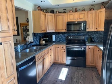 This well-maintained lake home has been totally remodeled with on Bayside Golf Course in Nebraska - for sale on GolfHomes.com, golf home, golf lot