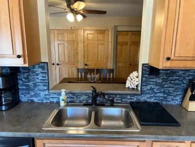 This well-maintained lake home has been totally remodeled with on Bayside Golf Course in Nebraska - for sale on GolfHomes.com, golf home, golf lot