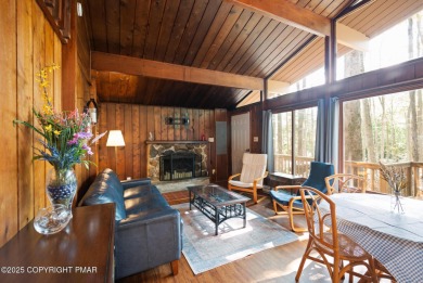 Let the outside in with this beautiful original Lake Naomi cabin on Lake Naomi Timber Trails Golf Club in Pennsylvania - for sale on GolfHomes.com, golf home, golf lot