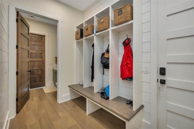 Finished in 2023, this stunning 4-bedroom, 3.5-bath home offers on The King and Prince Golf Course, Home of the Hampton Club in Georgia - for sale on GolfHomes.com, golf home, golf lot